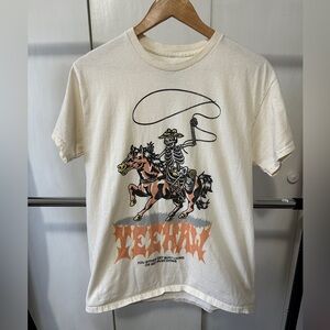 Graphic tshirt, cream colored.